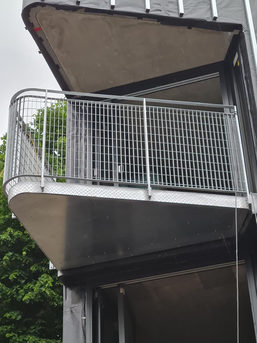Raw steel balcony frame structure mid-fabrication